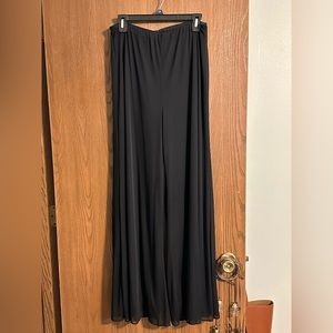 Chiffon dress pants with sheer chiffon over top.